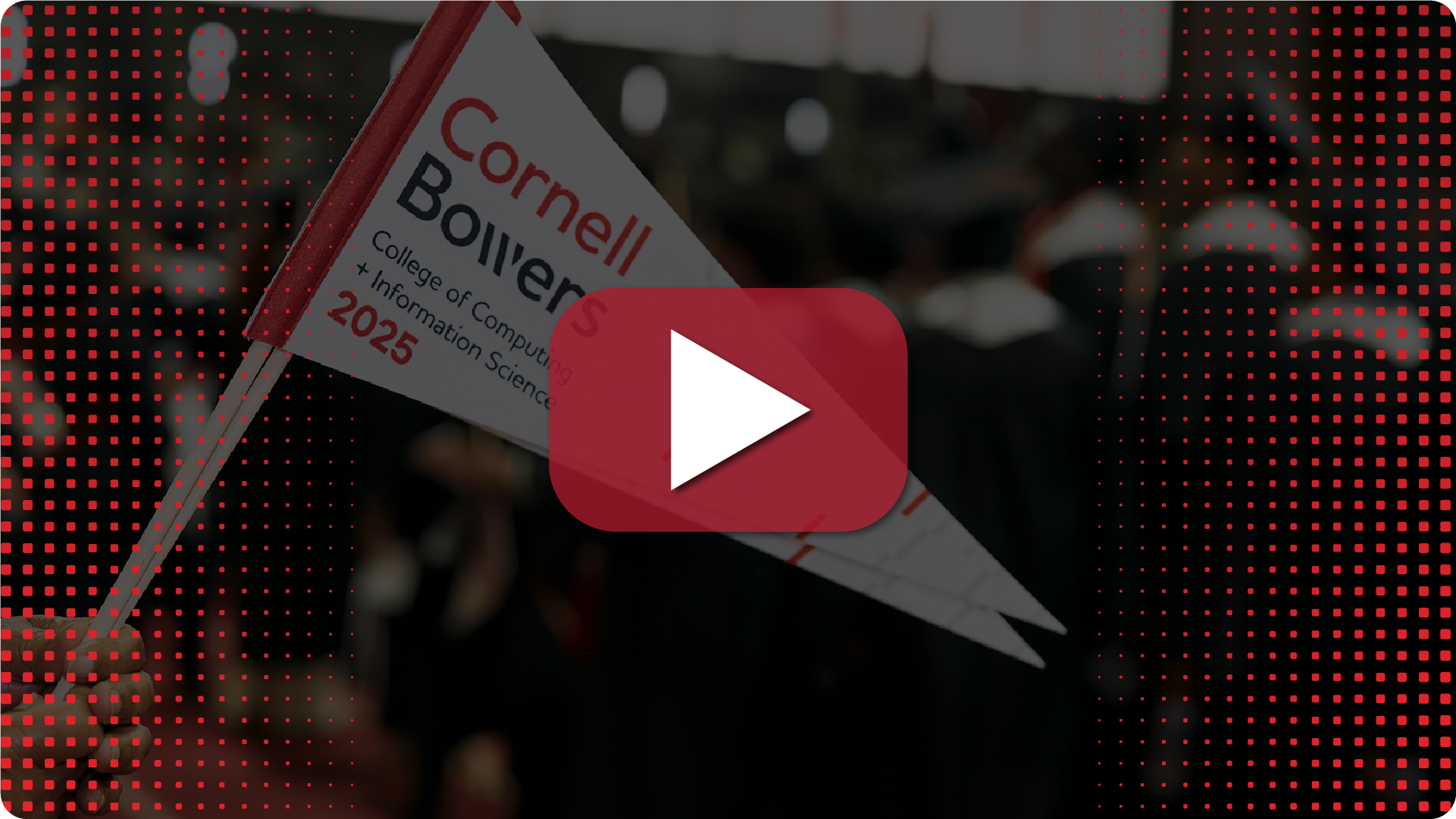 A photo of pennants with a dark overlay and red play icon.