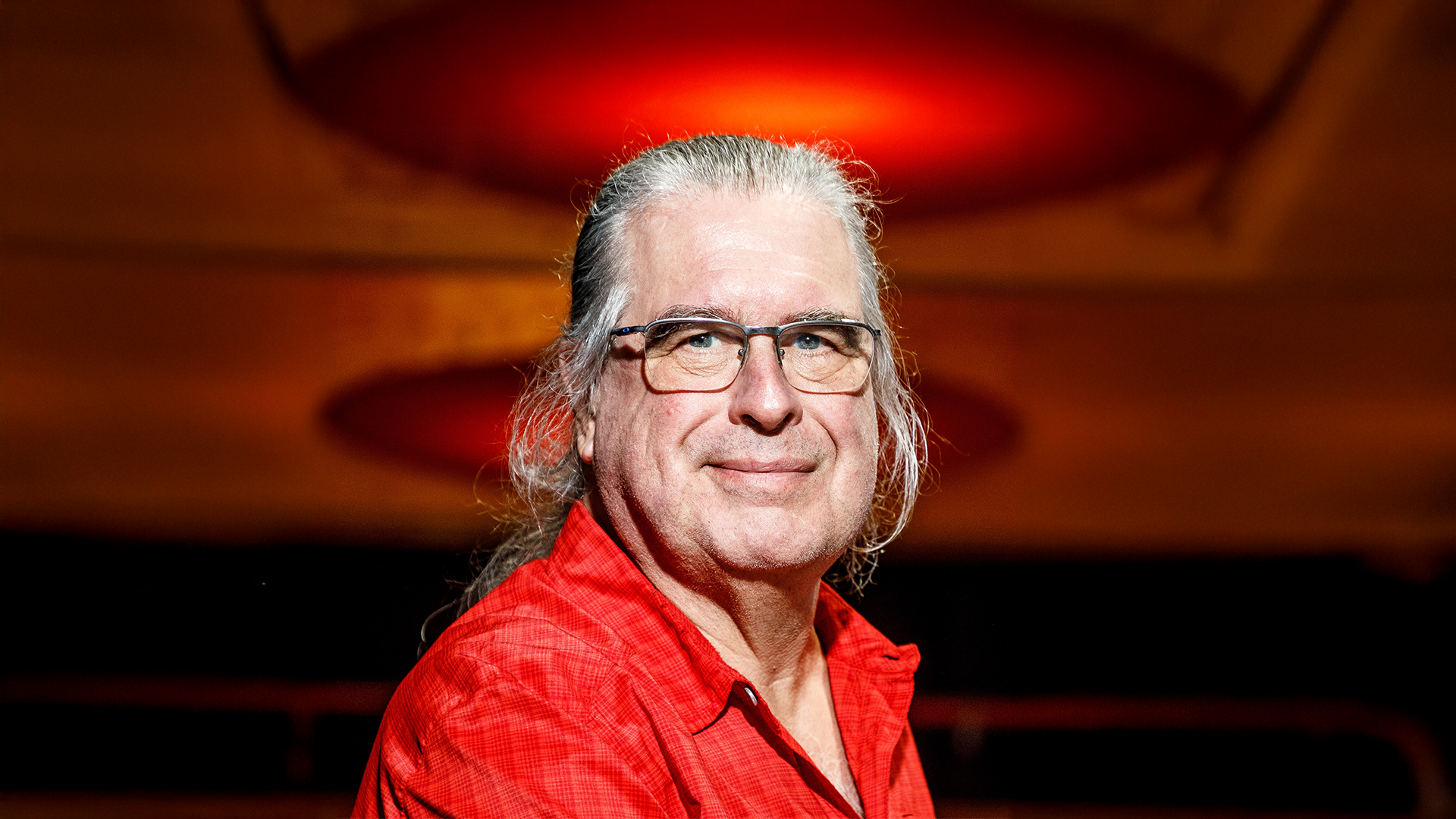 A color photo of a man.