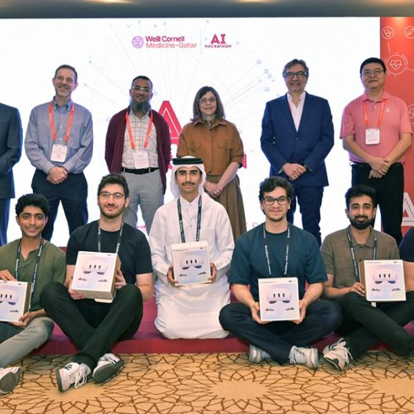 A color photo showing a group of people.