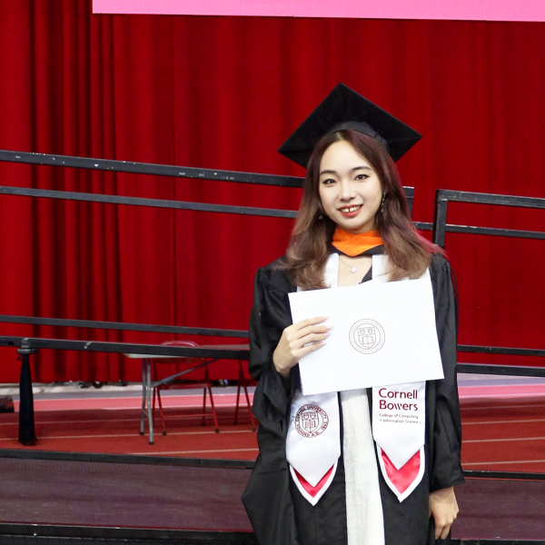 A color photo of a woman after graduation.