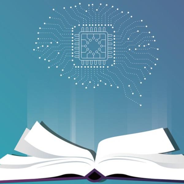 A book with white pages lies open while a brain with a computer chip in the center lies above it