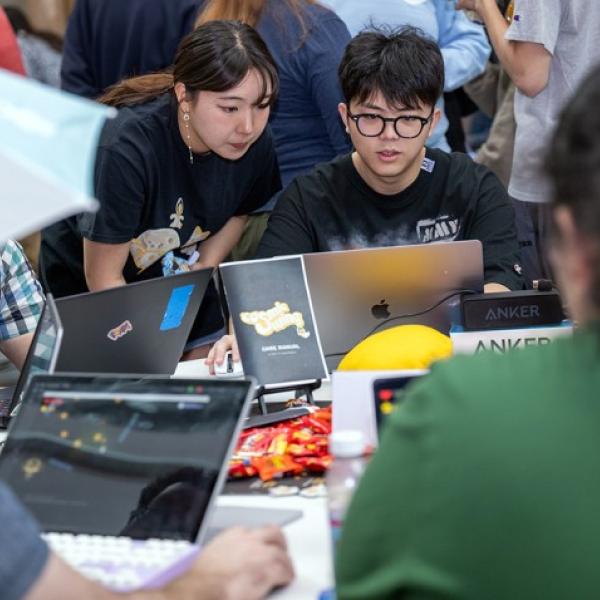 Visitors test drive new games at a previous GDIAC showcase