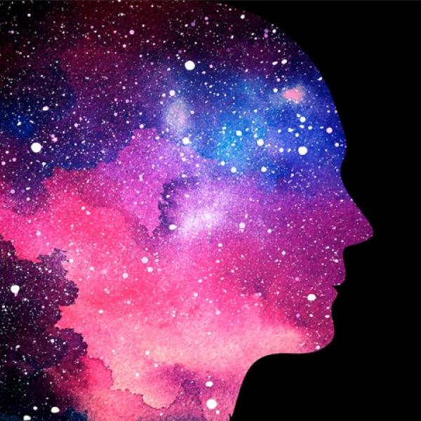 AI illustration of a profile of a human's face fading into a galaxy