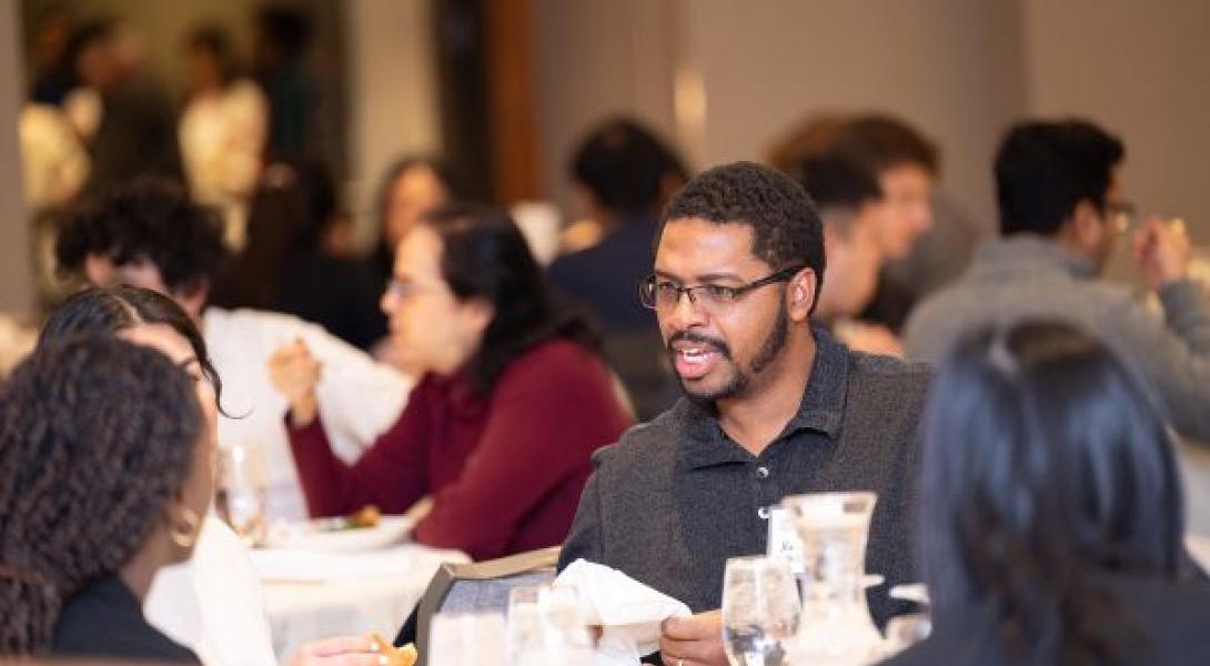 Hakim Weatherspoon chats with current students.