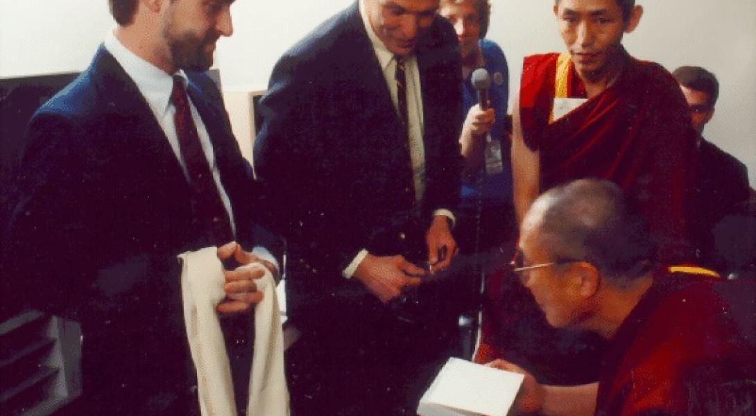 His Holiness the Dalai Lama with four of the people who worked on the animation.