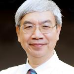 Portrait of man with glasses and graying hair 