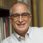 Portrait of man with glasses and graying hair 