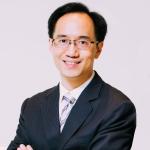 portrait Man in suit and wearing glasses