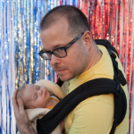 Photo of Chris Csíkszentmihályi holding his baby