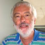man looking at camera, white beard and hair