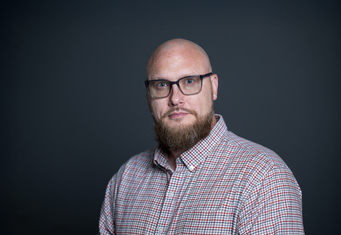 A color photo of Darren Murphy