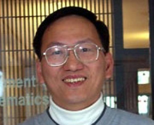 Portrait of man wearing glasses, dark hair