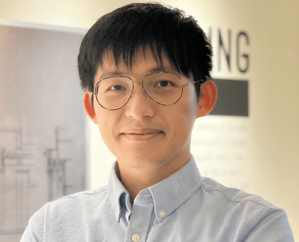  A photo of Wei-Chiu Ma, a man with black hair, glasses and a gray shirt