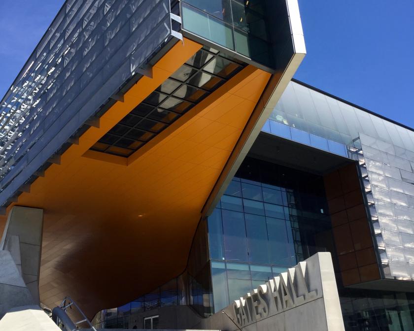 View of the orange ceiling of Gates hall with blue sky